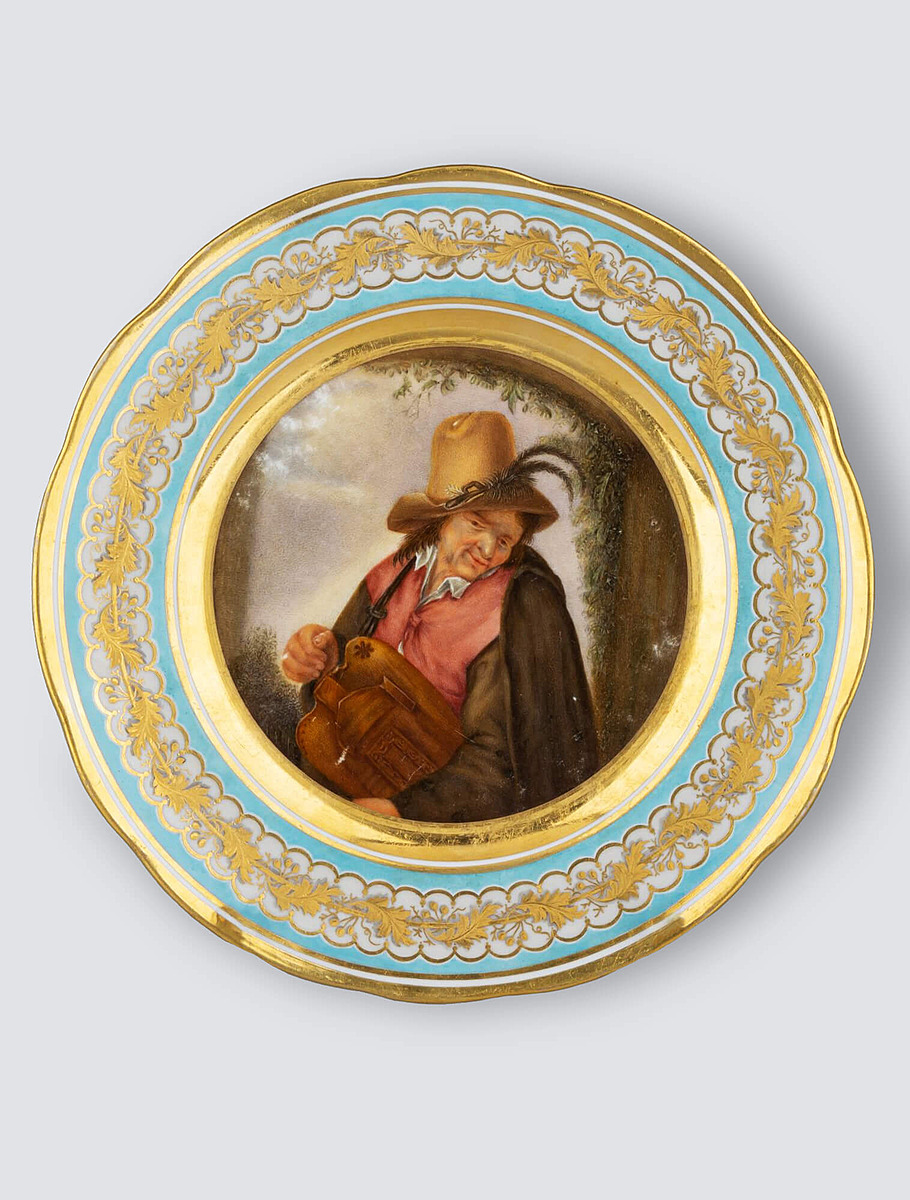 Тарелка с росписью по мотивам картины Адриана ван Остаде «Рылейщик», 19 век